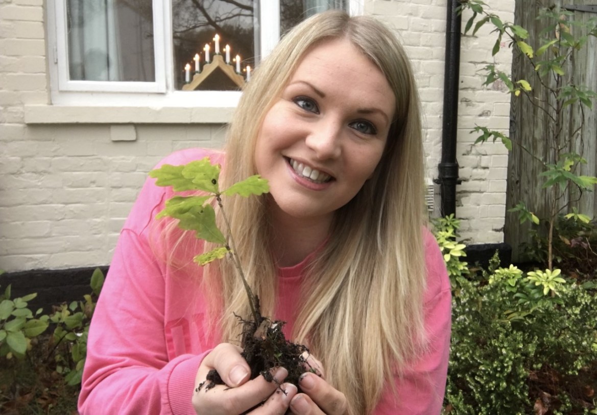 kate-on-conservation-with-oak-tree-sapling